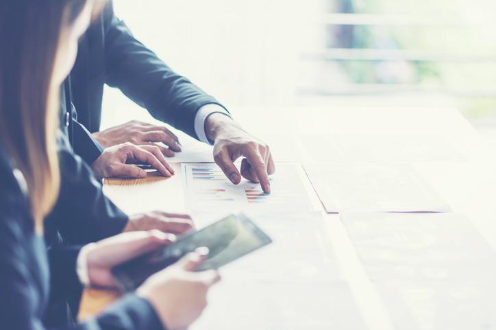 Banking business or financial analyst desktop accounting charts, indicates in the graphics